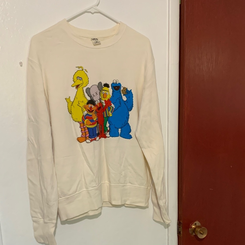 Uniqlo Cream Sweater with Colorful Character Design